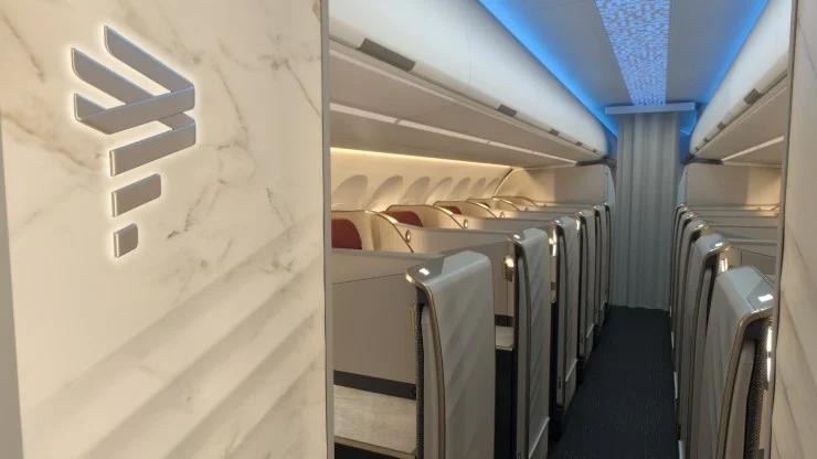 Interior view of a modern airplane cabin, featuring stylish seating, soft lighting, and a decorative airline logo on a wall.