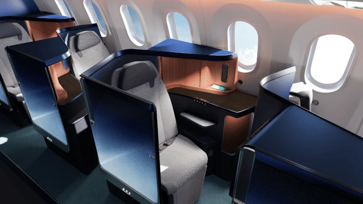 Interior view of a modern aircraft cabin showcasing comfortable seating and design elements, emphasizing style and functionality.